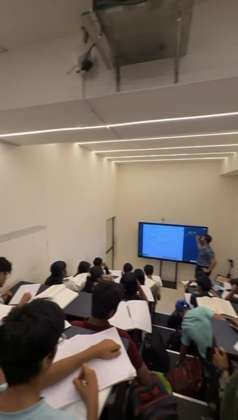 Teacher taking a class on the smart board with students at Twinkll Career Institute, Kalyan West